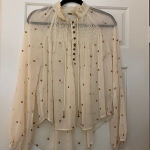 Free People shear high neck blouse.